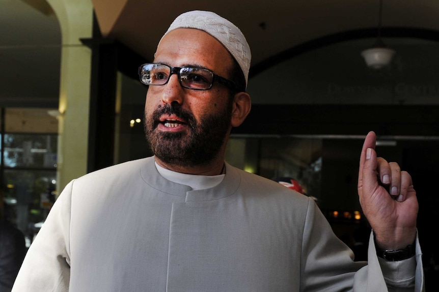 Muslim cleric Man Haron Monis arrives at Downing Centre in 2011