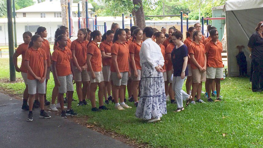 The Gondwana Indigenous Children's Choir prepare to sing at the memorial service and tree planting.