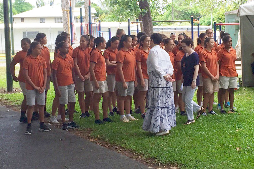 The Gondwana Indigenous Children's Choir prepare to sing at the memorial service and tree planting.
