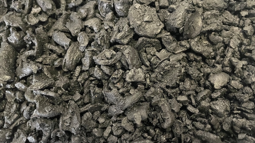 Photo of black charcoal close up.