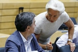 Euclid Tsakalotos listens to Christine Lagarde at eurozone meeting