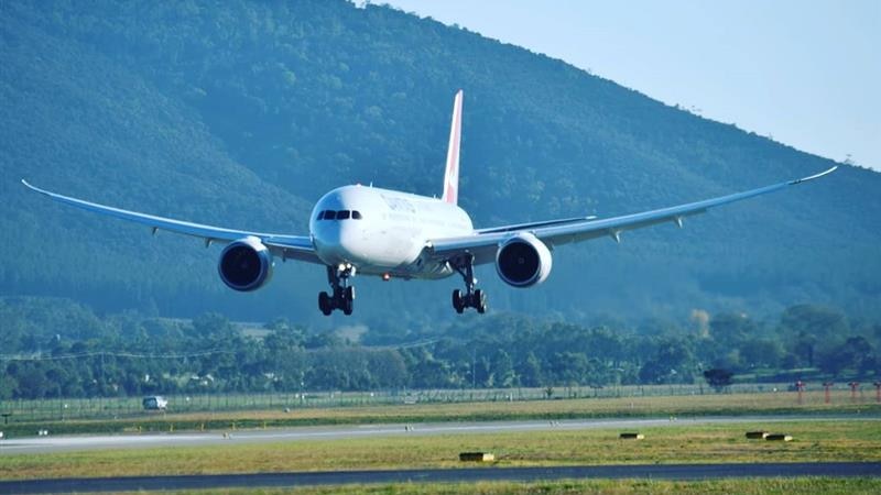A Qantas plane touches down at Canberra airport
