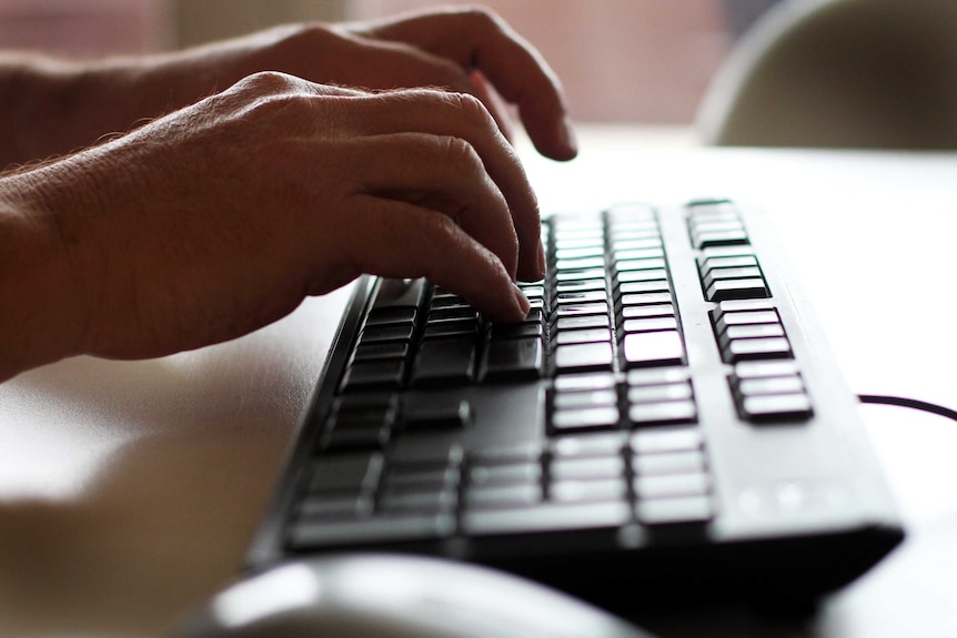 Hands on computer keyboard