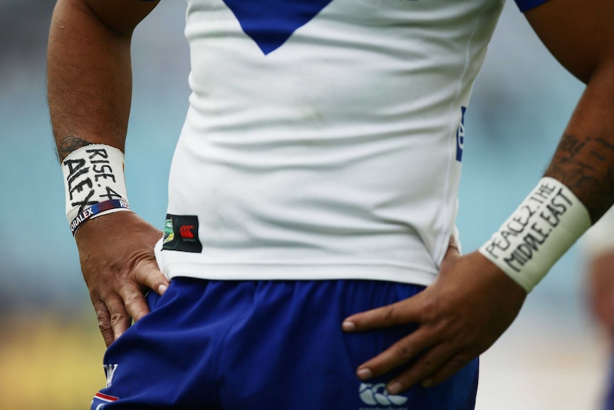 Krisnan Inu's wrist bands during 2014's Rise For Alex round