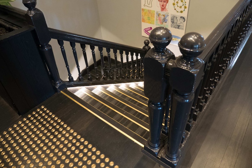 The original staircase has been kept through renovations.