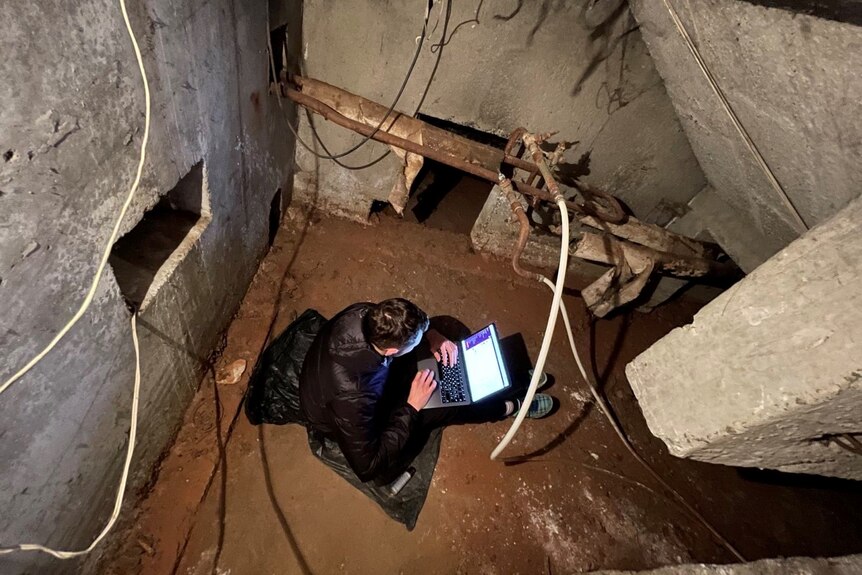 An aerial veiw of someone working on a laptop