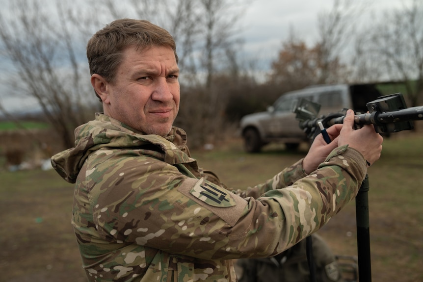 A man wearing a military uniform.