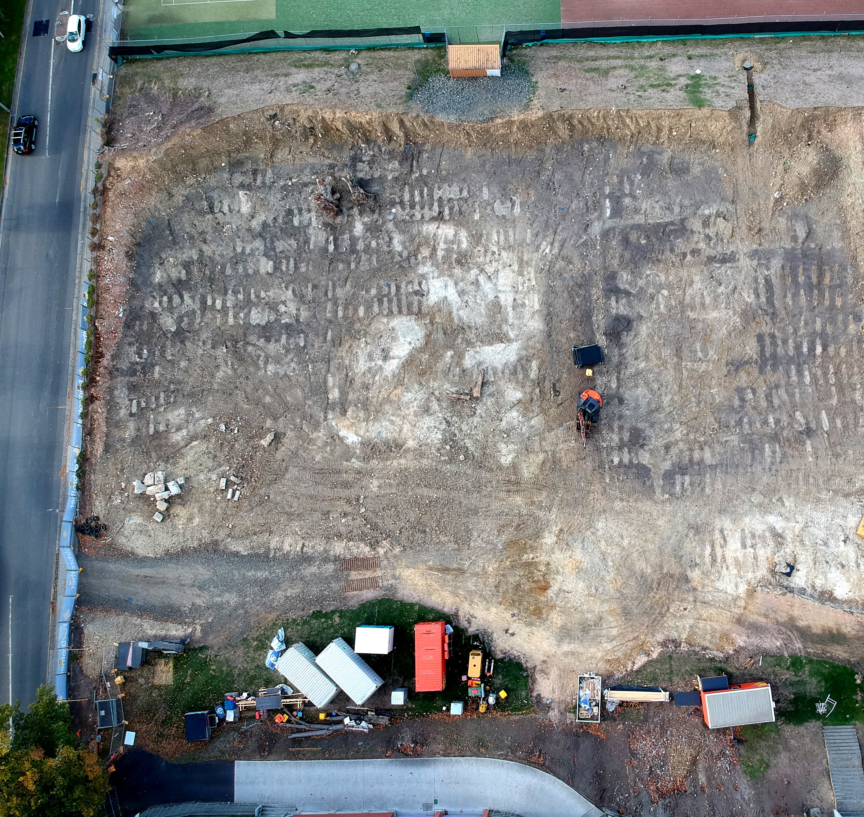 Drone view of excavation project at school grounds.