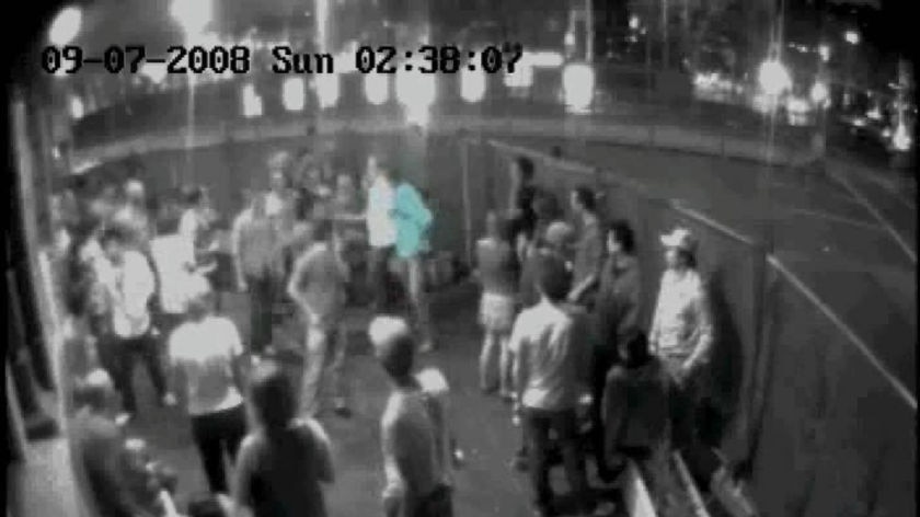 Security camera vision from QBH nightclub, showing Matthew McEvoy (coloured blue) being attacked.