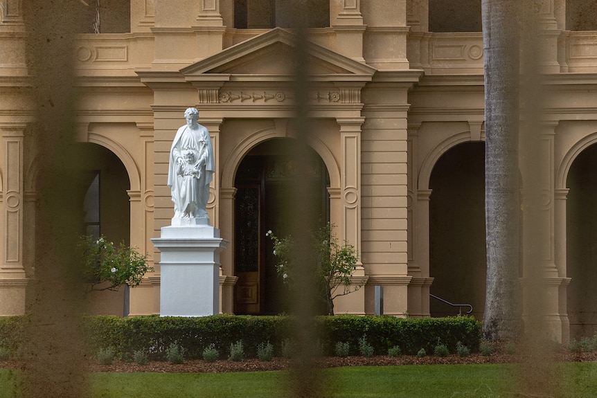 White statue on right side, Nudgee School in Brisbane