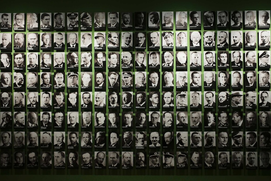 Pictures of co-conspirators of a failed attempt to kill Hitler are displayed at an exhibition.