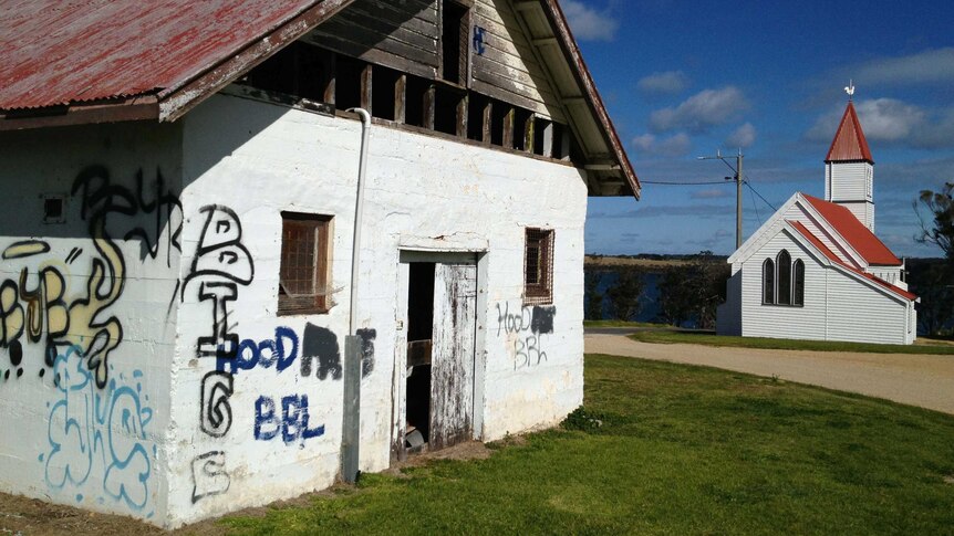 Graffiti covers the walls of a building in Lake Tyers.