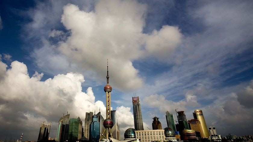 Clouds hang over skyscrapers at the Lujiazui Financial District in Shanghai