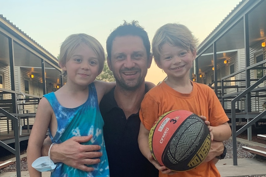 Assistant principal Brad Carmody and his two sons at Howard Springs.