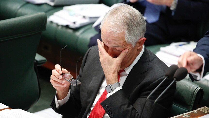 Prime Minister Malcolm Turnbull rubs his eyes during Question Time (12 Sept 2017