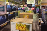 TVs on the shop floor at a JB Hi Fi store