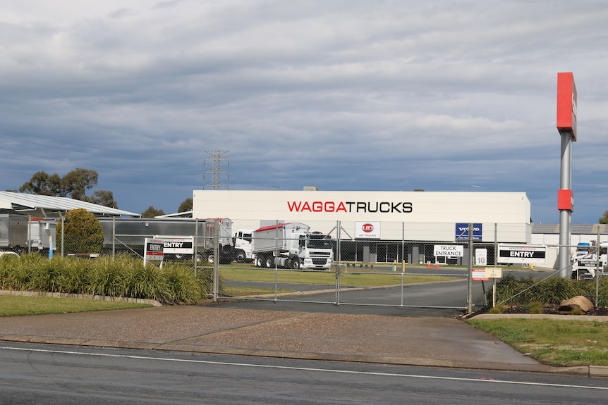 A photo of trucks outside the building at Wagga Trucks 