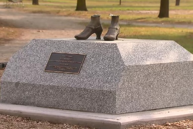 Statue depicting a female carer of war veterans left with only feet in Ascot Vale park in January 2016.