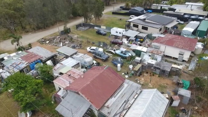 Aerial footage of homes and cars