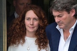 Rebekah Brooks leaves the Old Bailey courthouse in London with her husband Charlie.