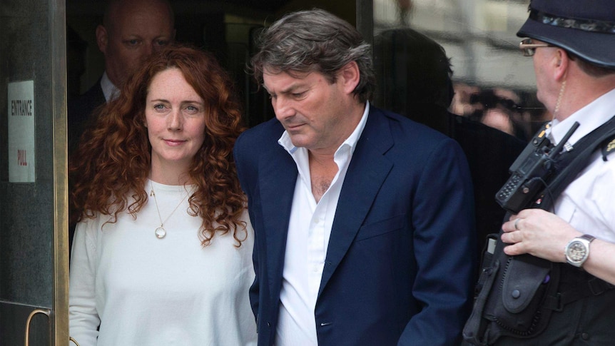 Rebekah Brooks leaves the Old Bailey courthouse in London with her husband Charlie.