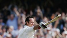 Michael Vaughan acknowledges the applause of the Old Trafford crowd