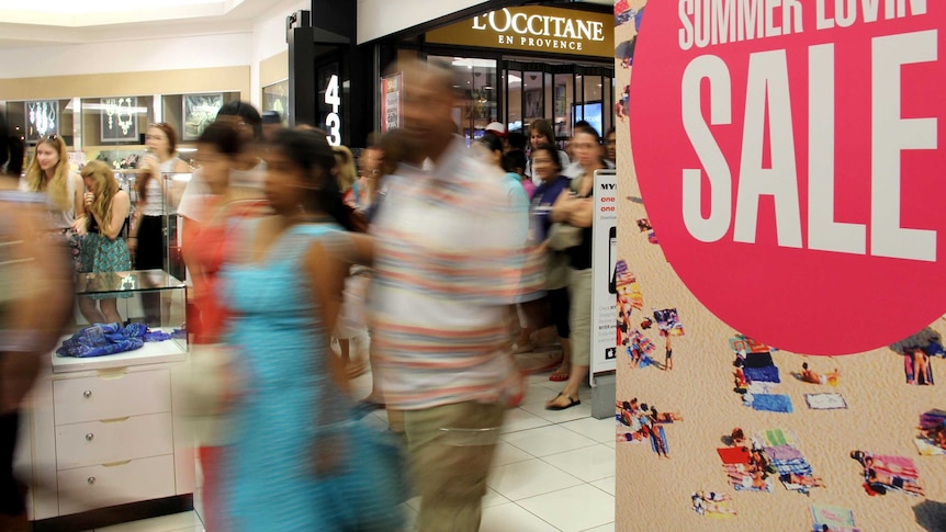 Shoppers rush at the start of the Boxing Day sales.