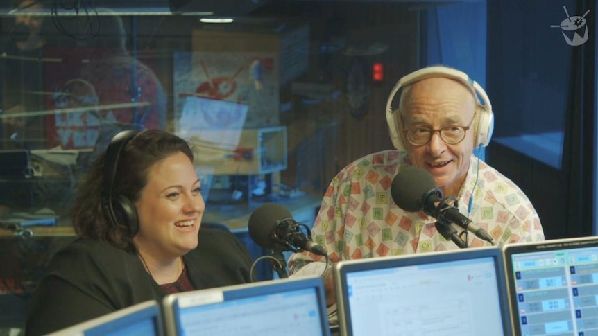 Dr Karl Kruszelnicki and Dr Maggie Hardy sit at microphone in radio studio