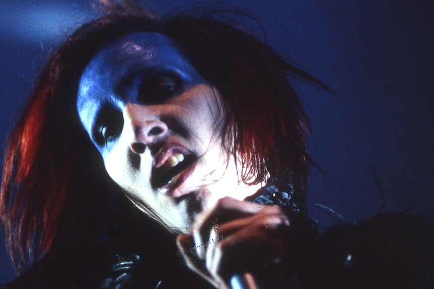 Close-up of Marilyn Manson performing on stage at the 1999 Big Day Out
