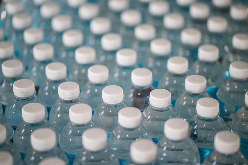 Rows of plastic water bottles.