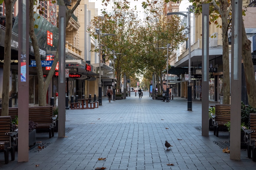 A picture of an empty mall in the Perth CBD with a person in the distance.