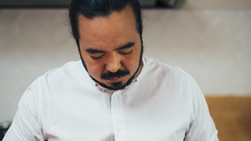 Adam Liaw holding his favourite knife