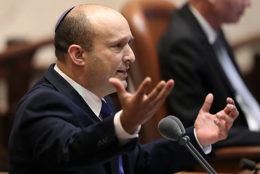 Naftali Bennett speaks during a Knesset session in Jerusalem