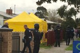 Counter-terrorism police raid a house in Braybrook
