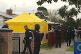 Counter-terrorism police raid a house in Braybrook