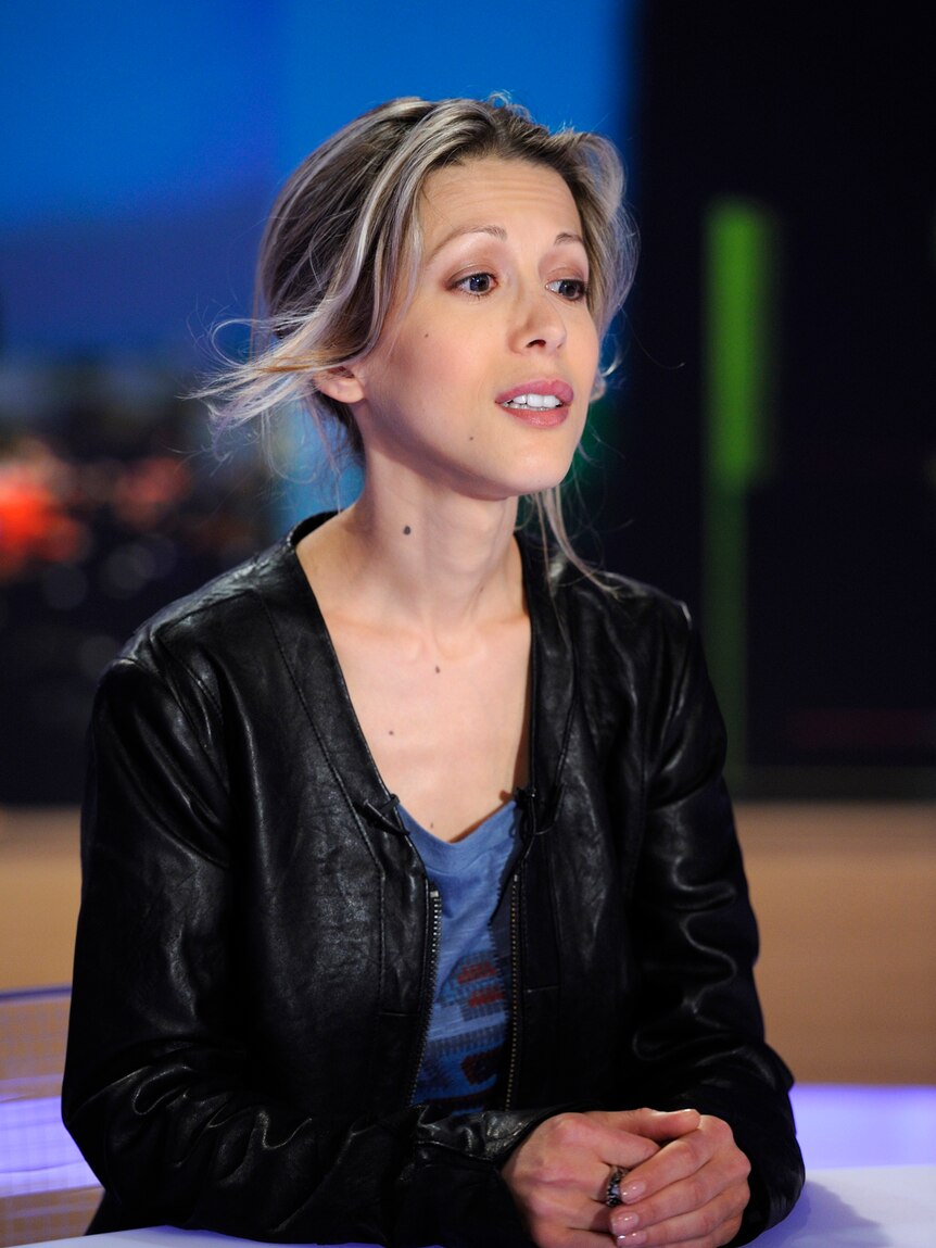 French novelist Tristane Banon poses prior to take part in the broadcast news of French TV channel TF1