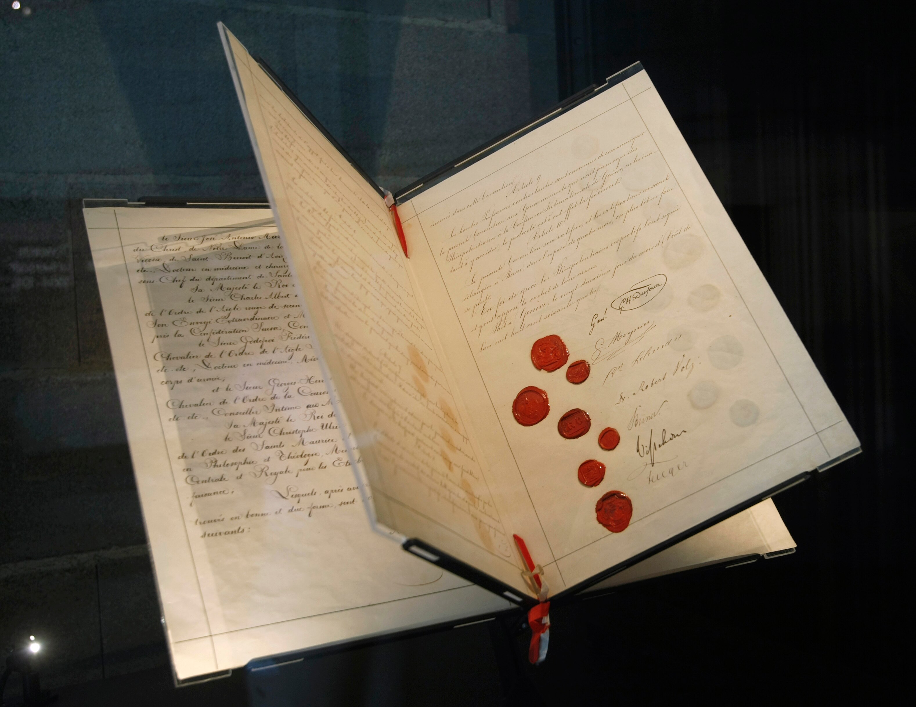 Image of the first Geneva Convention on display at the Red Cross museum in Geneva.
