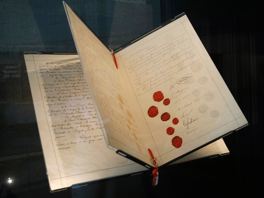 Image of the first Geneva Convention on display at the Red Cross museum in Geneva.