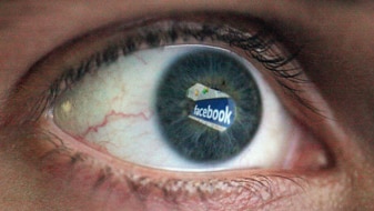 File photo: Facebook is reflected in the eye of a man (Getty Images: Dan Kitwood)