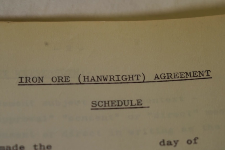 A yellowing, old piece of paper with the words 'Iron ore Hanwright agreement'