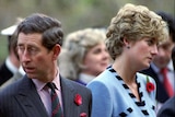 Princess Diana and Prince Charles look separate directions at an event in south korea marking the korean war