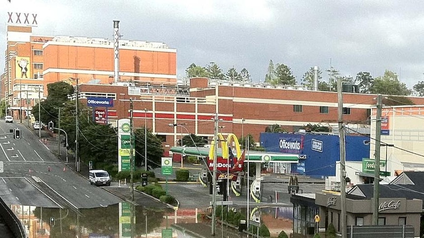 Brisbane's flooded Milton Road with XXXX brewery in background