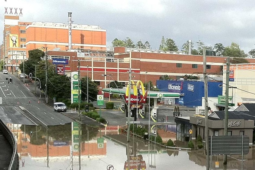Floodwaters cover Milton Road in the inner-Brisbane suburb of Milton (XXXX brewery in background) on January 12, 2011.