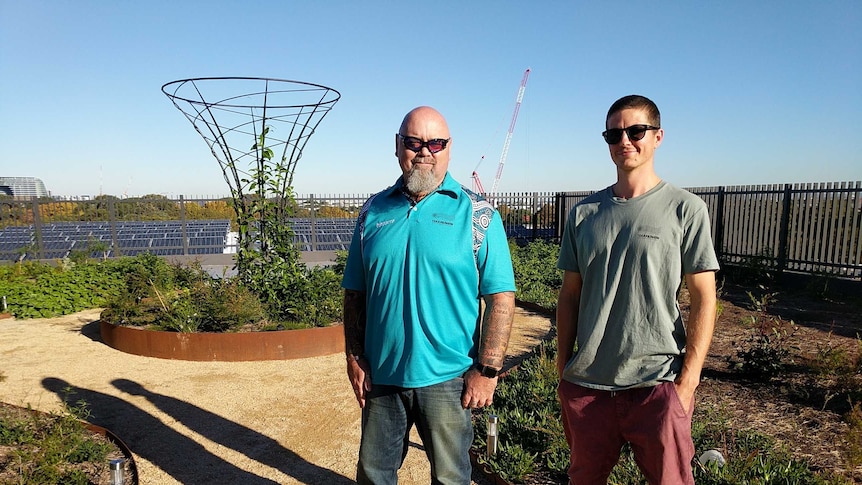 Co-Founder Christian Hampsen and permaculturist Matt McKay standing in Yerrabingin Rooftop Garden