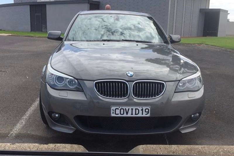 A BMW with a number plate COVID 19