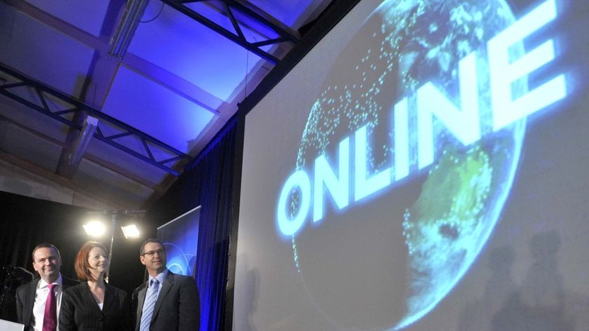 Online: Julia Gillard, David Bartlett and Stephen Conroy watch as the NBN is switched on in Tasmania in August