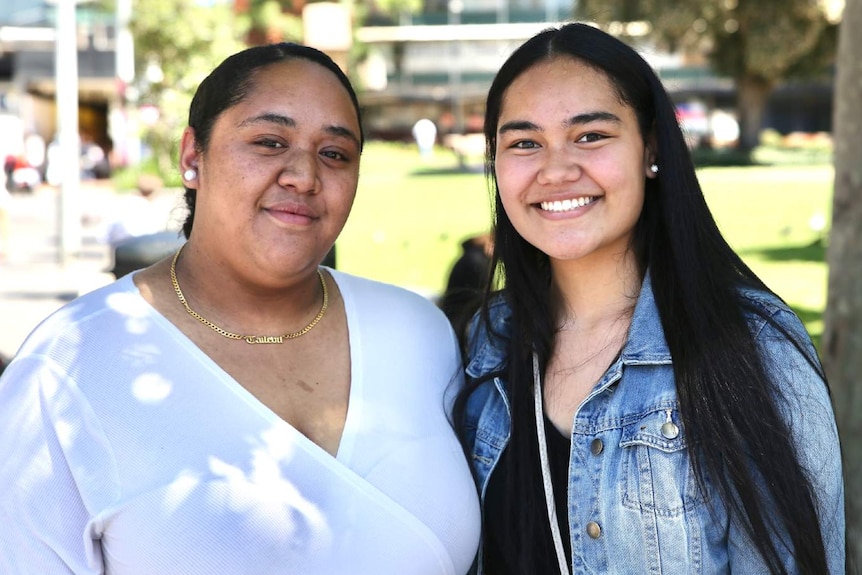 Two women smiling