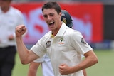 Cummins celebrates the wicket of De Villiers