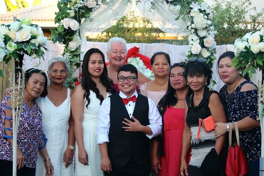 9 women at a wedding