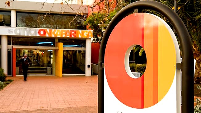 A shot of Onkaparinga City's council offices, brightly decorated in orange.